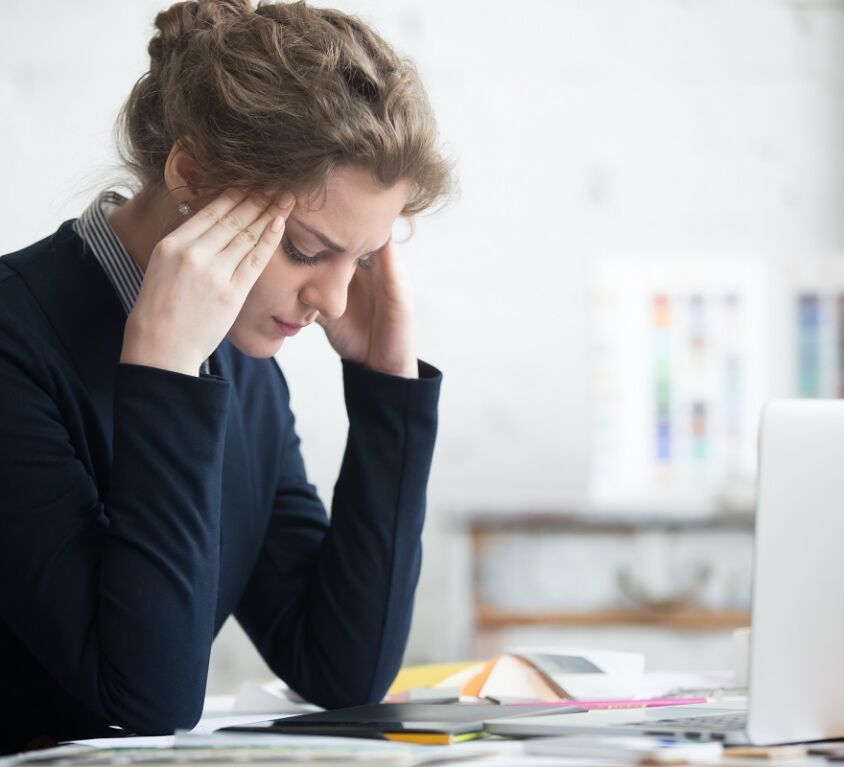 images of a young business women stressed