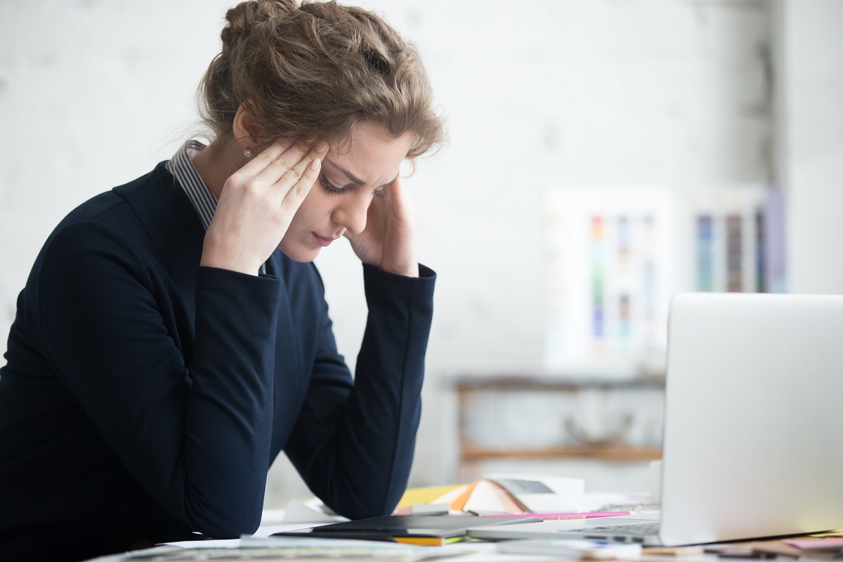 images of a young business women stressed